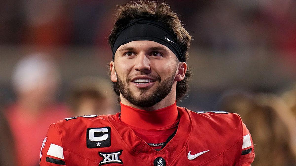 Brendan Sorsby walking off the field at Nippert Stadium in Cincinnati