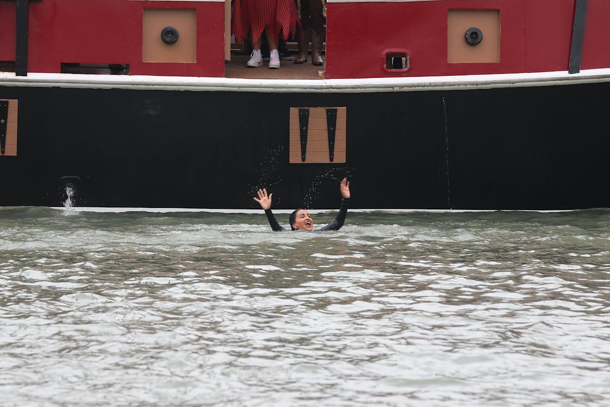 Mayor Paulette Guajardo cheers to a crowd of people after the Dunking of the Mayor event for Buc Days in Corpus Christi Bay May 2, 2024.
