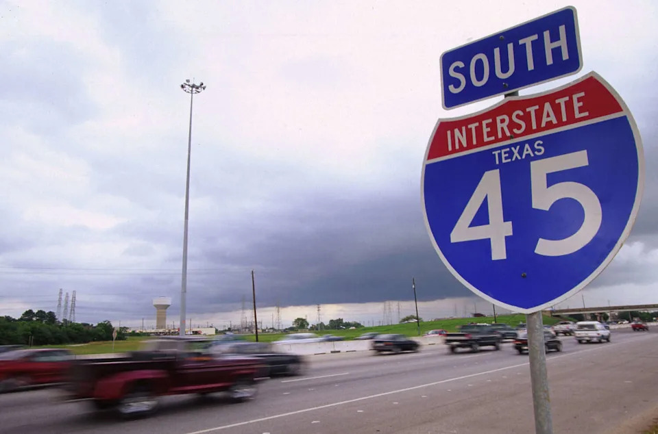 Cars drive on the infamous Interstate-45, July 12, 1999 between Houston and Galveston, Texas. Over the years many bodies have been found near this highway, and the Calder Road area just off the interstate near Houston has been called the "killing fields" by some Texas officials. (Paul S. Howell/Getty Images)