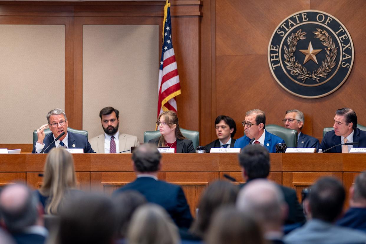 AUSTIN, TEXAS - APRIL 28: State Sen. Charles Perry (R-TX) speaks to the Eastman family during a hearing on Camp Mystic at the Texas State Capitol on April 28, 2026 in Austin, Texas. Owners and employees of Camp Mystic have begun offering testimony and answering questions from lawmakers regarding their response to the deadly flooding at the campsite last year. (Photo by Brandon Bell/Getty Images)