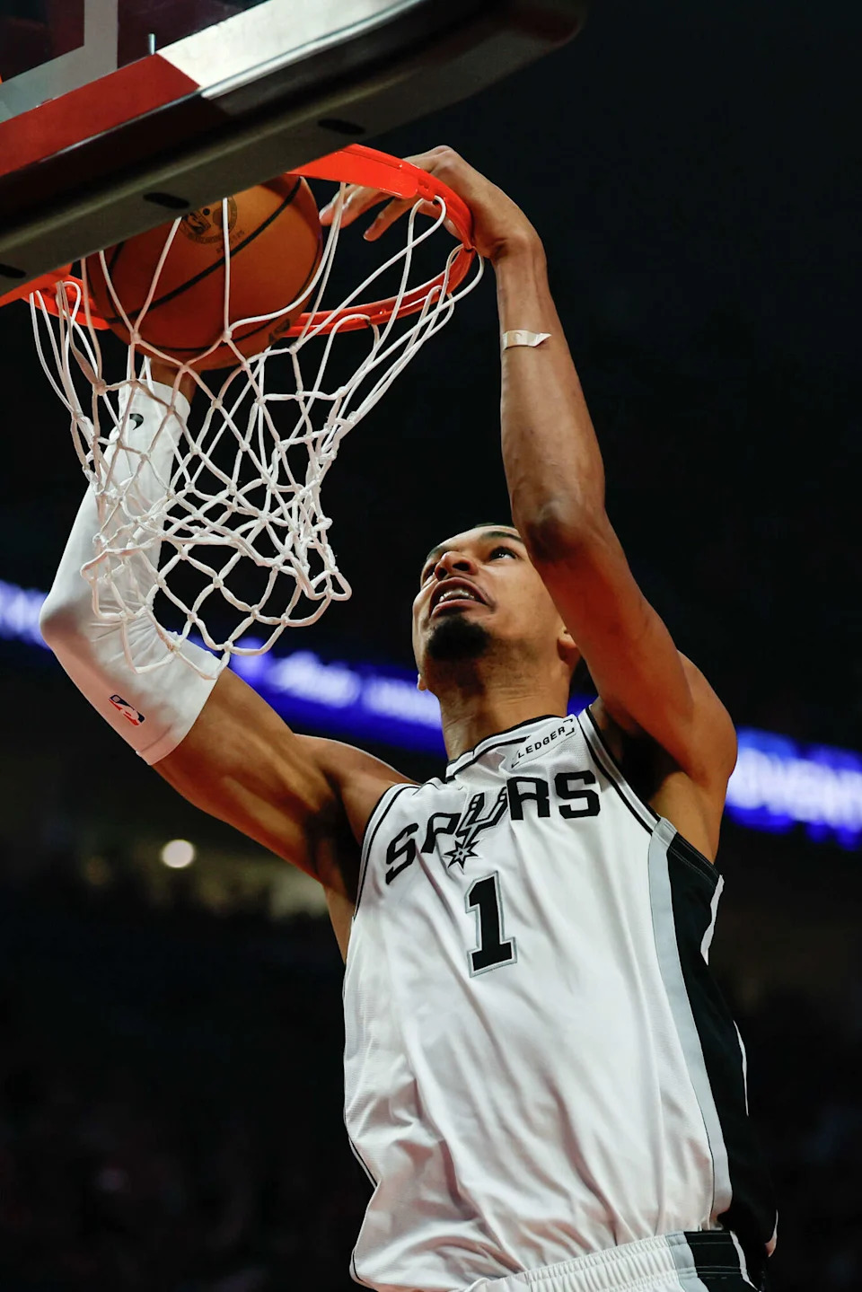 San Antonio Spurs forward Victor Wembanyama (1) dunks on the Portland Trail Blazers during the first quarter of Game 4 of a first-round NBA playoff series at Moda Center on Sunday, April 26, 2026. (Sam Owens/San Antonio Express-News)