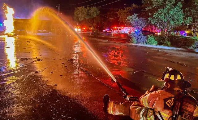 A firefighter at the scene of the massive fire in Fort Worth, Texas.Credit: Craig Trojacek/Fort Worth Fire Dept.
