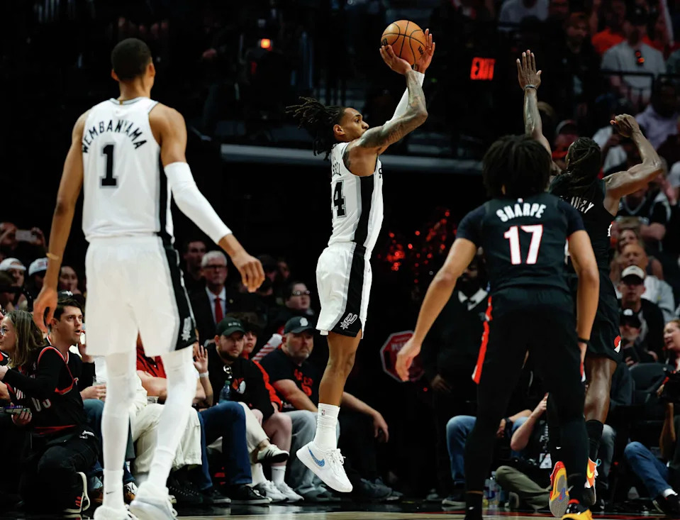 San Antonio Spurs guard Devin Vassell (24) goes up for a shot during the third quarter of Game 4 of a first-round NBA playoff series against the Portland Trail Blazers at Moda Center on Sunday, April 26, 2026. (Sam Owens/San Antonio Express-News)