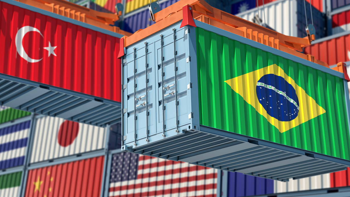 A photographic illustration showing import shipping containers with different country flags.