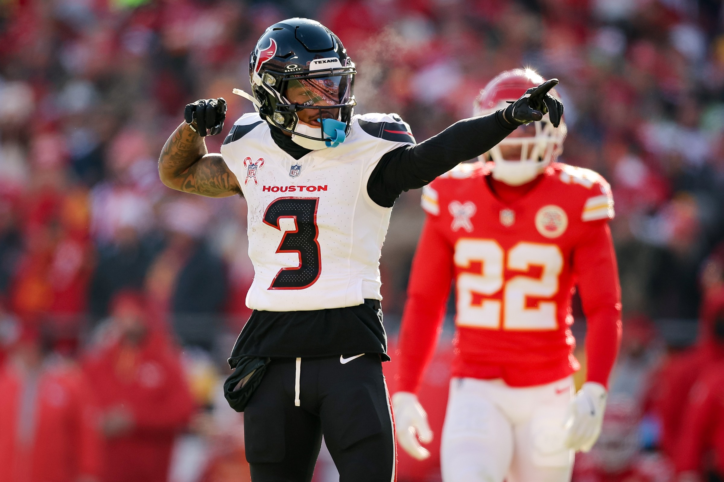 KANSAS CITY, MISSOURI - DECEMBER 21: Tank Dell #3 of the Houston Texans reacts following a second quarter catch leading to a first down against the Kansas City Chiefs at GEHA Field at Arrowhead Stadium on December 21, 2024 in Kansas City, Missouri. (Photo by David Eulitt/Getty Images)
