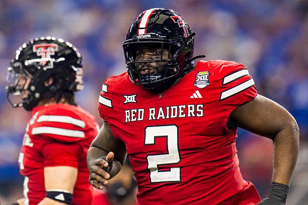 ARLINGTON, TEXAS - DECEMBER 06: Lee Hunter #2 of the Texas Tech Red Raiders runs across the field during the first half the Big 12 Championship game against the BYU Cougars at AT&amp;T Stadium on December 06, 2025 in Arlington, Texas.  (Photo by John E. Moore III/Getty Images)