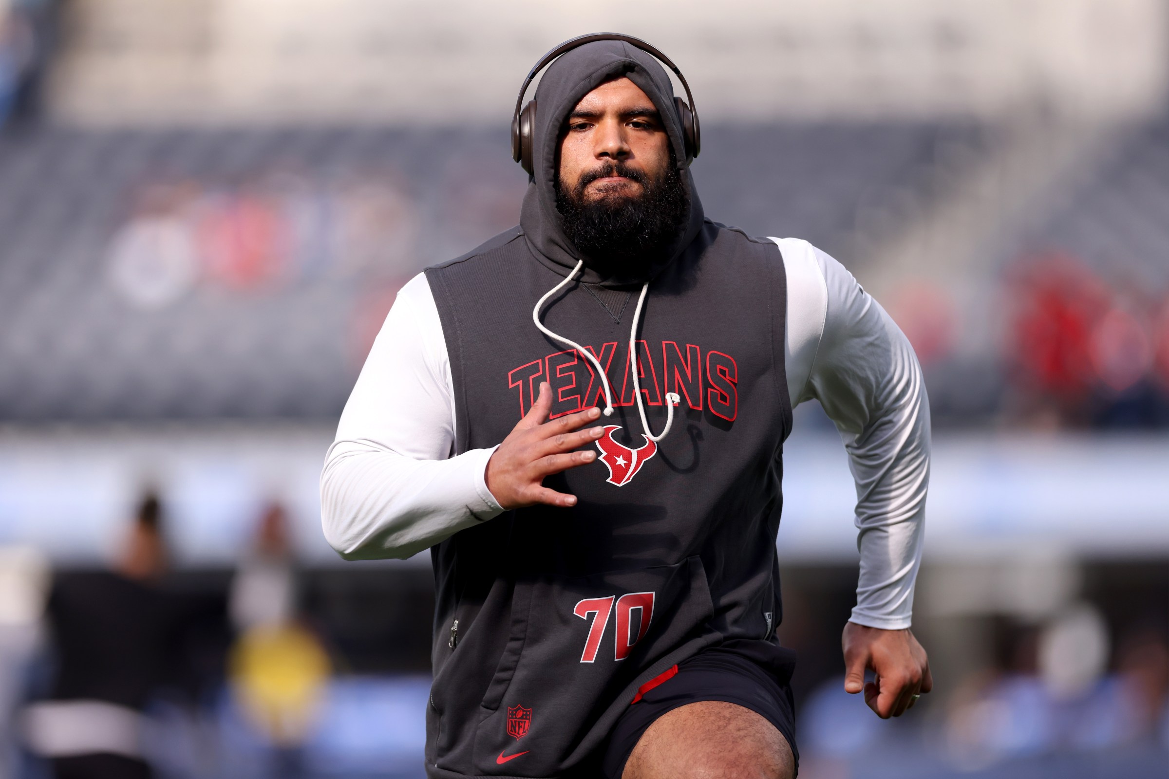 INGLEWOOD, CALIFORNIA - DECEMBER 27: Juice Scruggs #70 of the Houston Texans warms up prior to NFL 2025 game against the Los Angeles Chargers at SoFi Stadium on December 27, 2025 in Inglewood, California. (Photo by Katelyn Mulcahy/Getty Images)