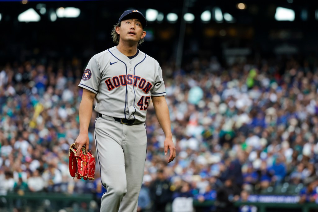 Houston Astros pitcher Tatsuya Imai (45) departs the mound during a pitching change.