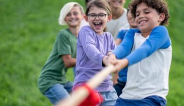 Kids playing tug-of-war at summer camp in Collin County for 2026.