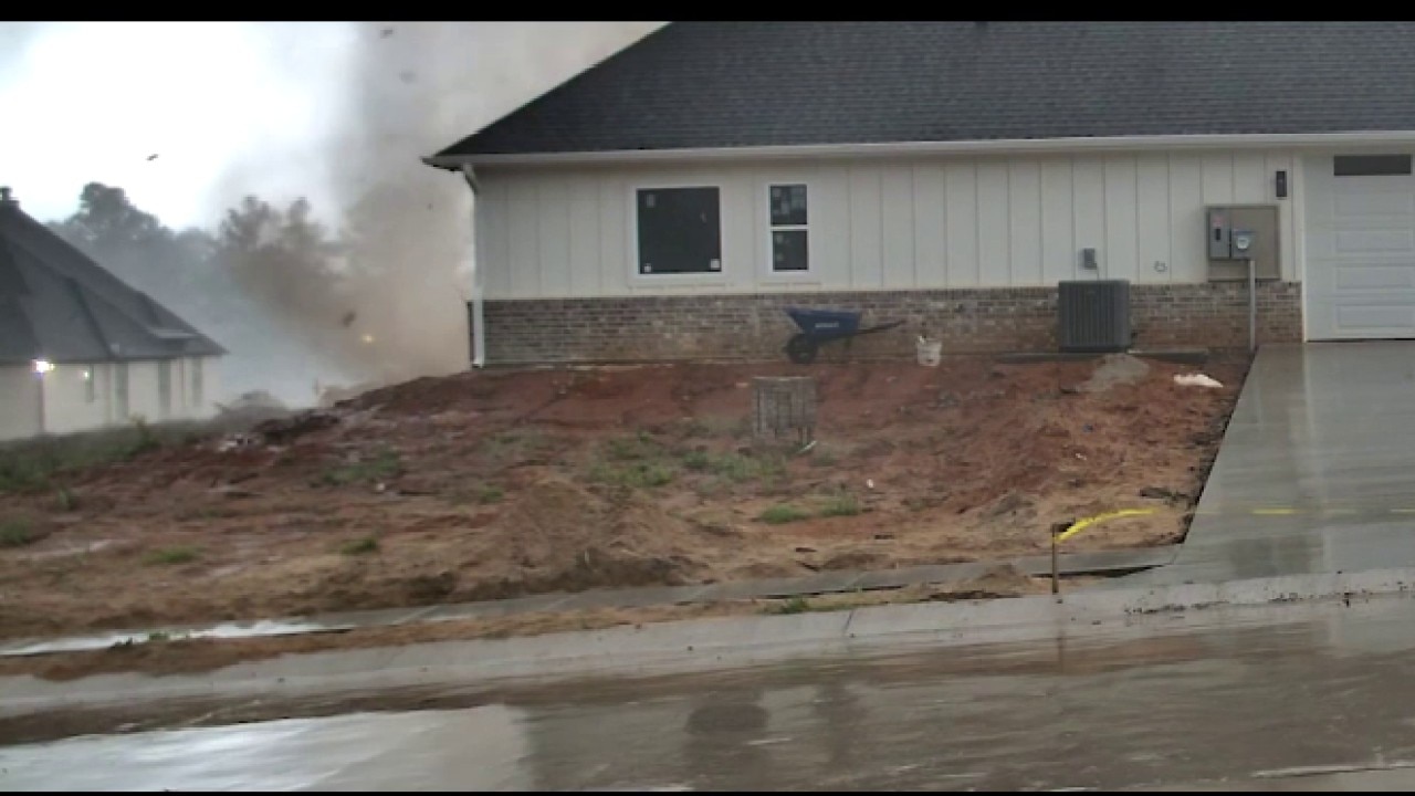 Funnel cloud swirls past East Texas home