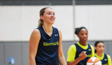 Dallas Wings guard Paige Bueckers handles the ball during a team drill on the opening day of 2026 training camp in Arlington.