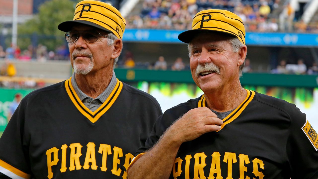 Tim Foli, left, and Phil Garner, the middle infield of the 1979 World Championship Pittsburgh Pirates team attend a pre-game ceremony remembering the team's accomplishment 40 years ago before a baseball game between the Pittsburgh Pirates and the Philadelphia Phillies in Pittsburgh, July 20, 2019. (AP Photo/Gene J. Puskar)