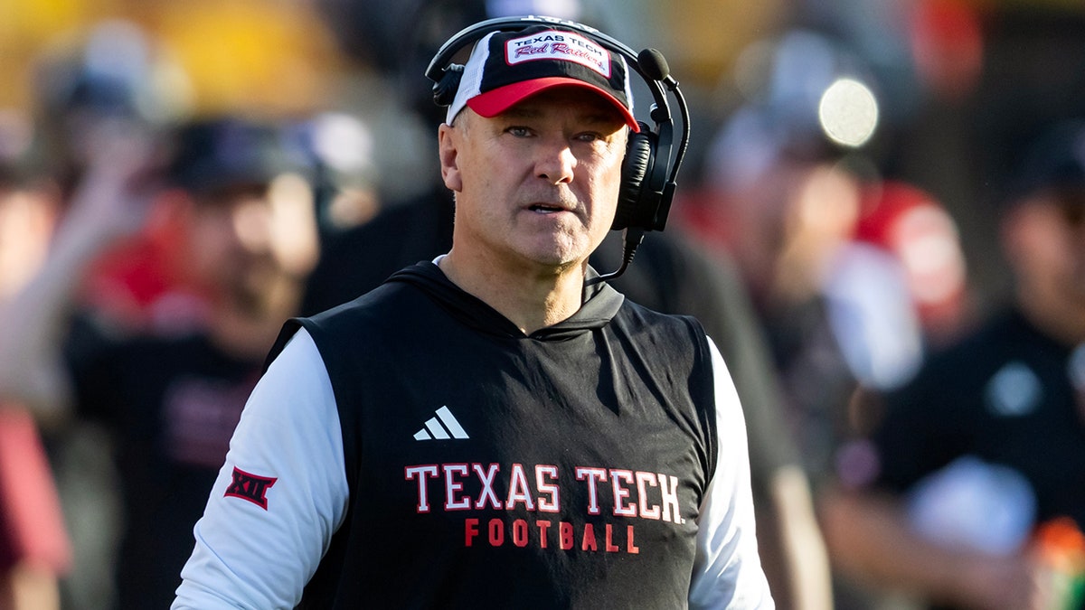 Texas Tech Red Raiders head coach Joey McGuire coaching on the sidelines at Mountain America Stadium
