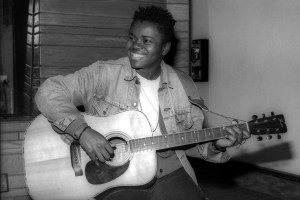 Tracy Chapman plays her Fender acoustic guitar at a recording studio in Los Angeles, California, circa 1988.