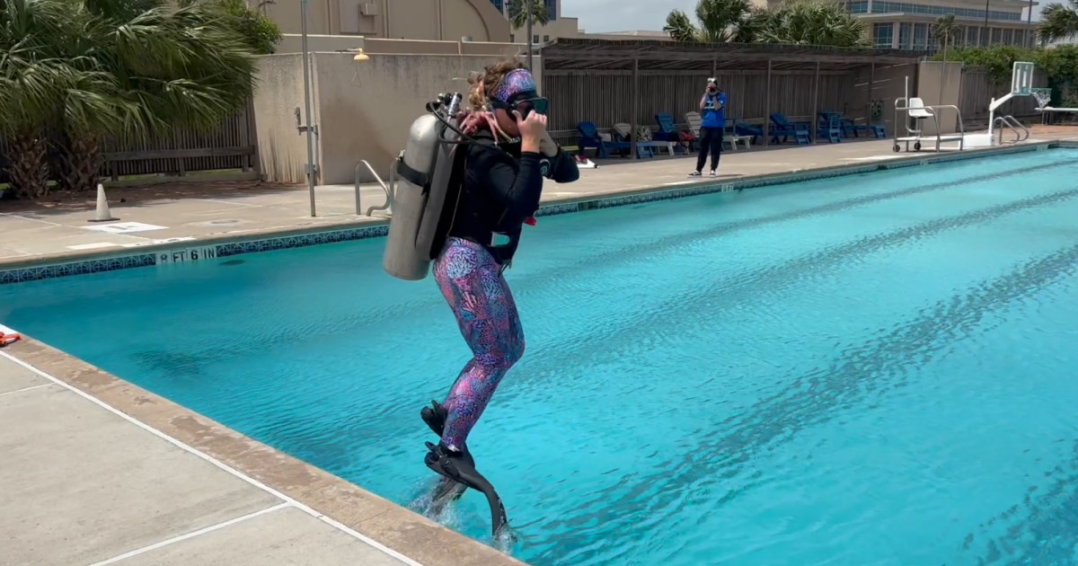 TAMU-CC students train on a life-size coral reef replica in a pool
