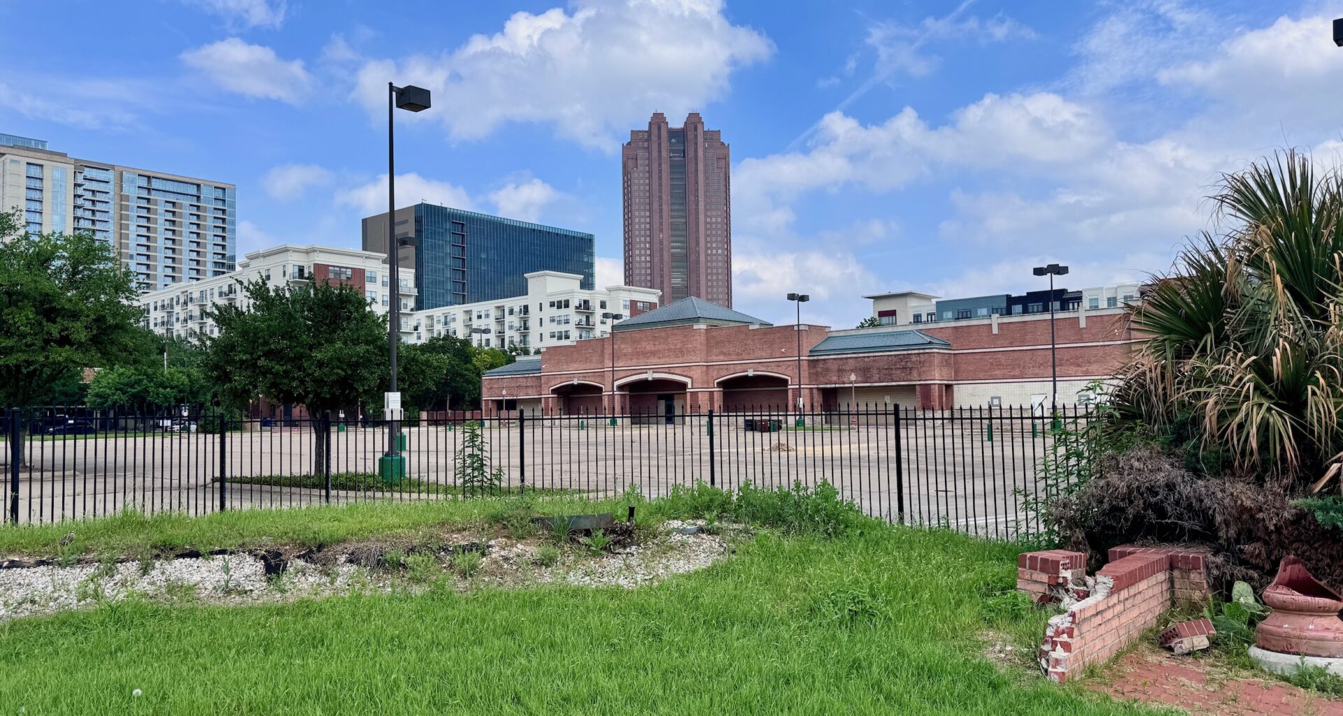 a vacant grocery store parking lot