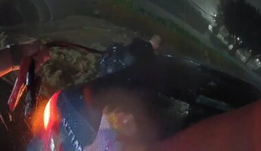 Footage shows North Texas officers rescue woman from car stranded by flood water