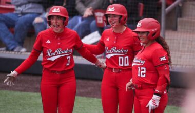 Texas Tech players Makayla Garcia (3), Jackie Lis (00) and Jasmyn Burns greet Mia Williams at home after a home run against Baylor during a Big 12 Conference softball game, Friday, May 1, 2026, at Tracy Sellers Field.