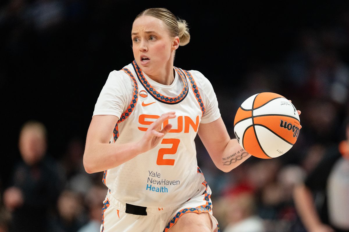 Guard Hailey Van Lith #2 of the Connecticut Sun dribbles the ball up court during the first half against the Portland Fire at Moda Center on May 18, 2026, in Portland, Oregon.