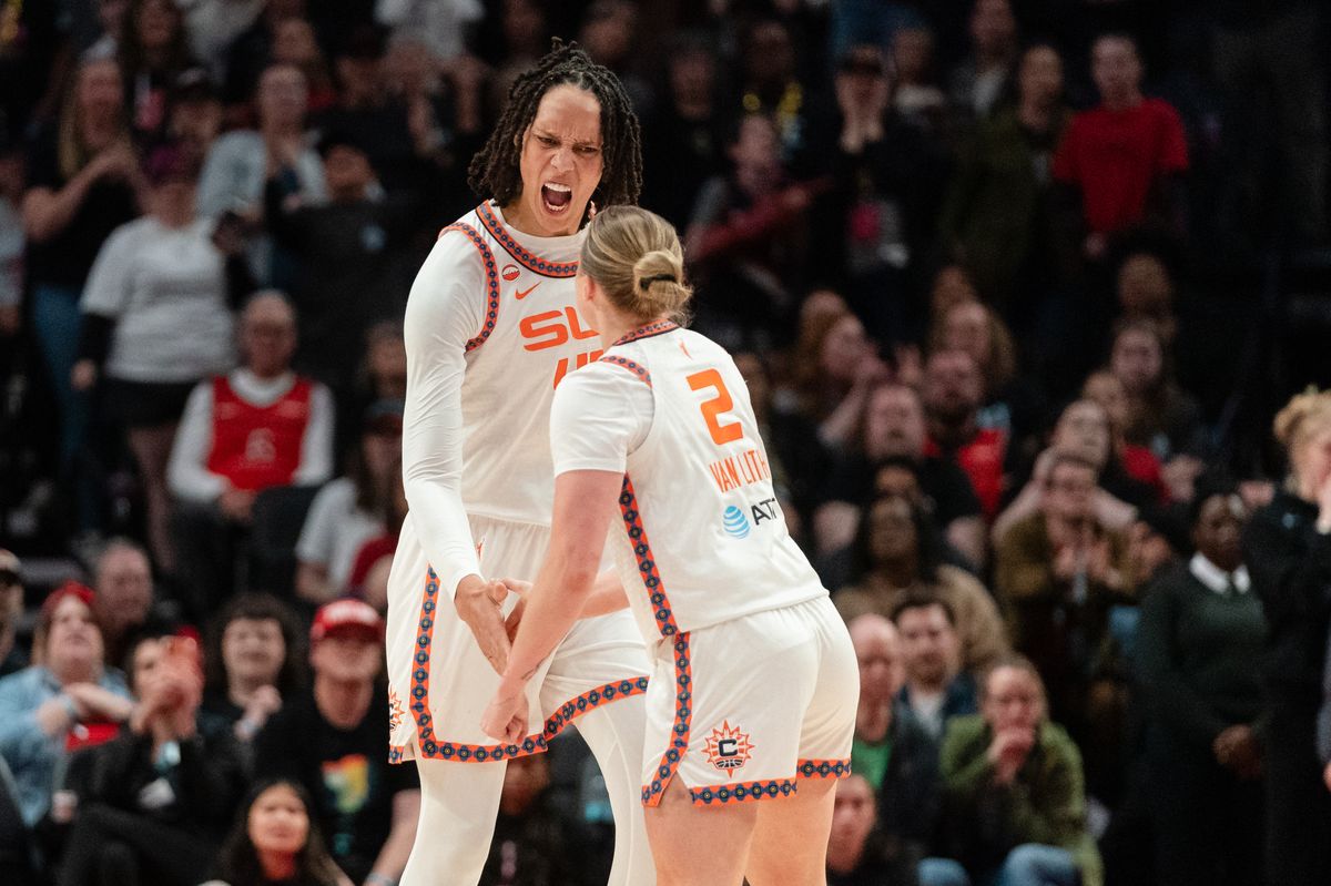 Center Brittney Griner #42 of the Connecticut Sun reacts after Hailey Van Lith #2 made a basket during the second half of the game against the Portland Fire at Moda Center on May 18, 2026, in Portland, Oregon.