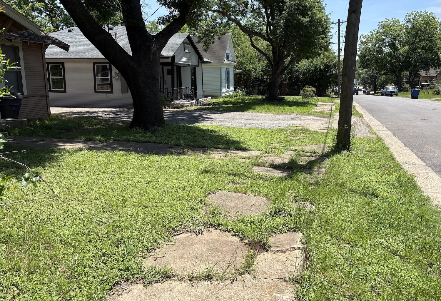 broken sidewalks in 10th street