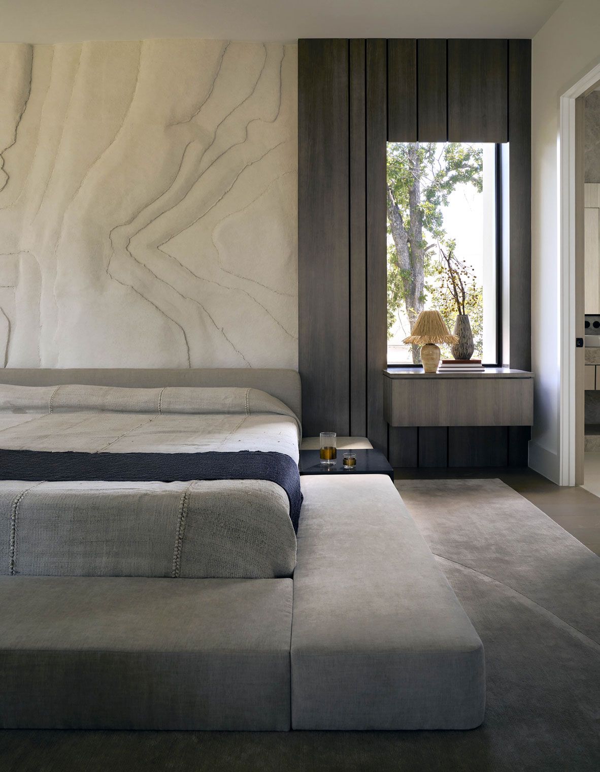 Image may contain Indoors Interior Design Cup Home Decor Furniture Bed Bedroom Room and Floor