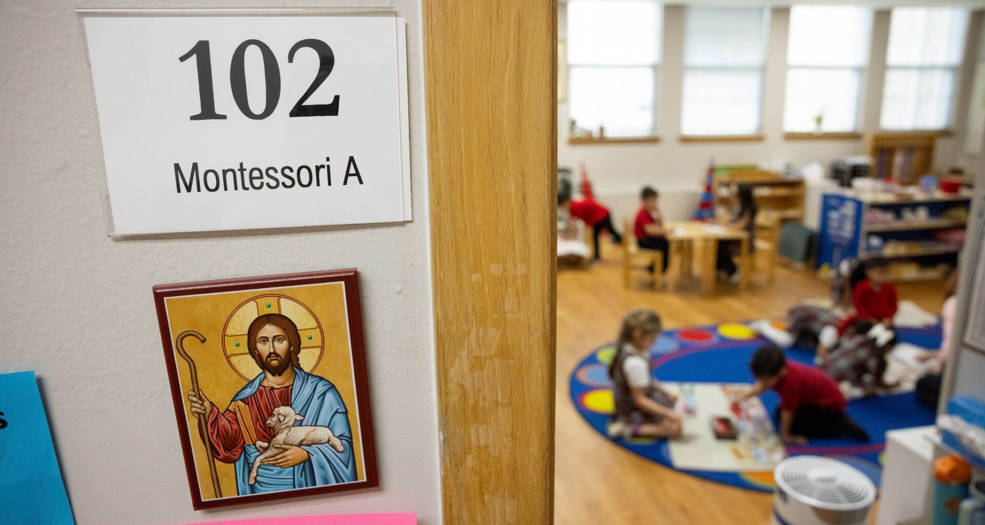 Students listen to Phi Tran, a seventh grade math teacher, at Mount St. Michael Catholic School in Dallas, Wednesday, March 11, 2026.
