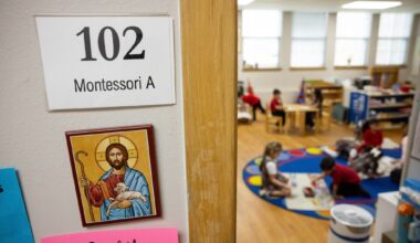 Students listen to Phi Tran, a seventh grade math teacher, at Mount St. Michael Catholic School in Dallas, Wednesday, March 11, 2026.