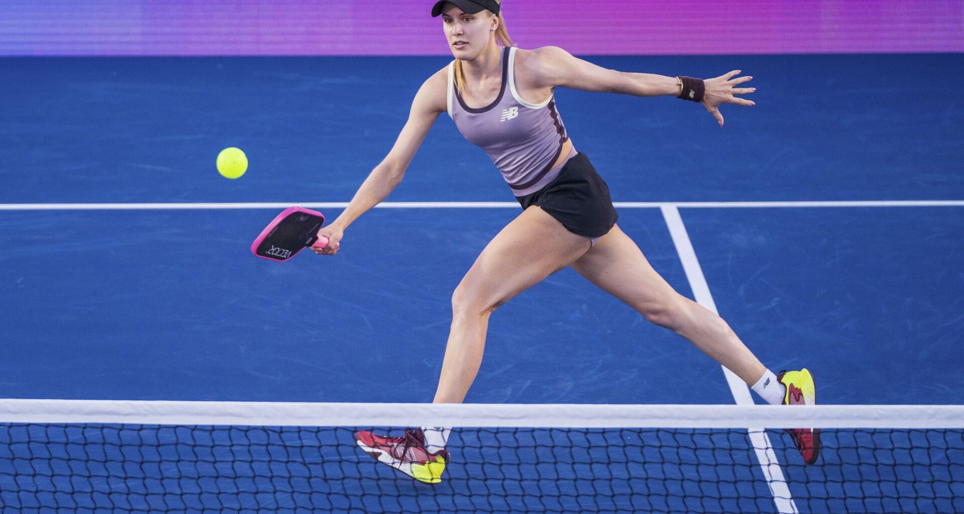 In this image provided by the Carvana PPA Tour, professional tennis player Eugenie Bouchard plays a shot during a pickleball match, Oct. 10, 2024, in Las Vegas. (Carvana PPA Tour via AP)