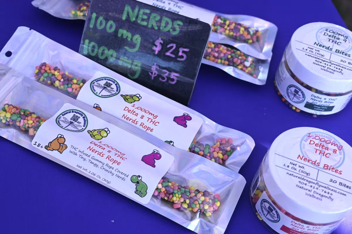 Delta 8 THC Nerds Rope gummies and Delta 8 THC Nerds Bites, legal cannabis products sold by Natural Dragonfly Wellness, are viewed at their booth during the Florida Man Games, Saturday, March 1, 2025, in Elkton, Fla.