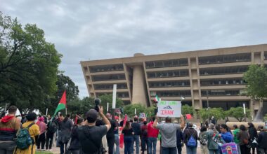 A crowd of more than 100 gather for a May Day rally in downtown at Dallas City Hall at 1500 Marilla St., on Friday May, 1, 2026.