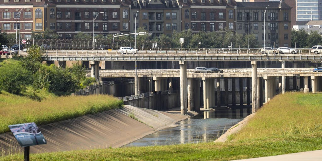 Search suspended for woman reportedly swept away in Houston waters