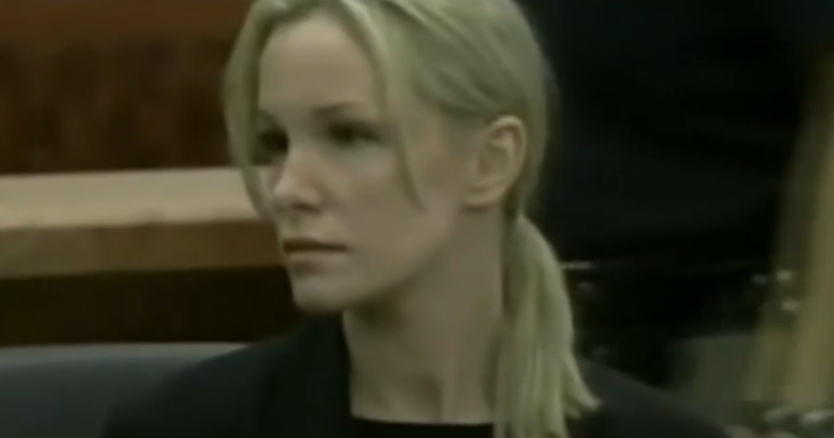Woman found guilty of stabbing her husband 193 times in 2003 charged following hit-and-run crash