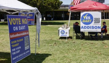 Signs in support and against DART are seen outside Addison Town Hall on Election Day on Saturday, May 2, 2026.