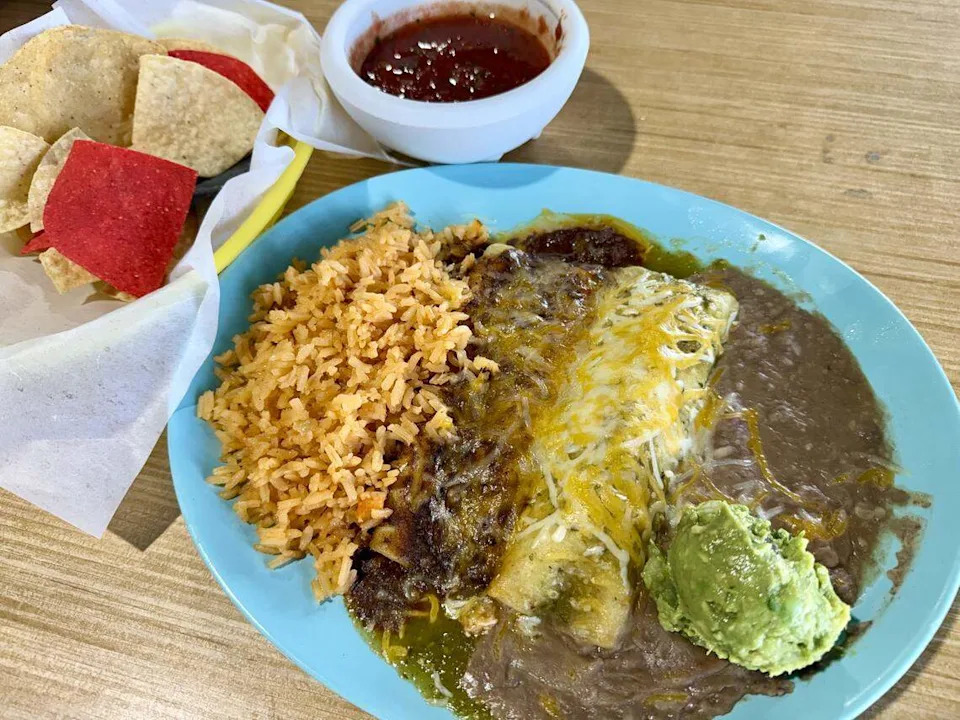 An enchilada special with a cheese enchilada and a green chicken enchilada at Anita’s Kitchen, seen April 9, 2026.