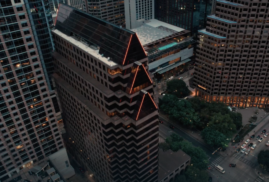 An aerial view of the building at 100 Congress Avenue.