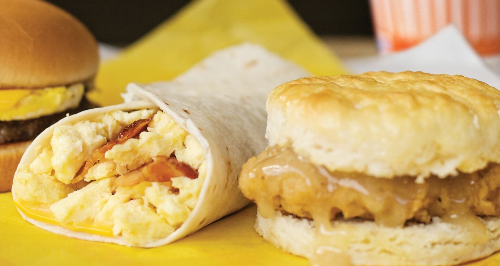 Taquito with cheese and bacon and a honey butter chicken biscuit.