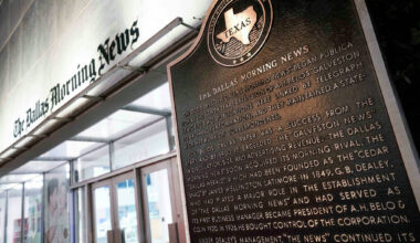 A historical marker is seen near the front entrance to the offices of The Dallas Morning News at 1954 Commerce Street in Dallas on Monday, Sept. 22, 2025.