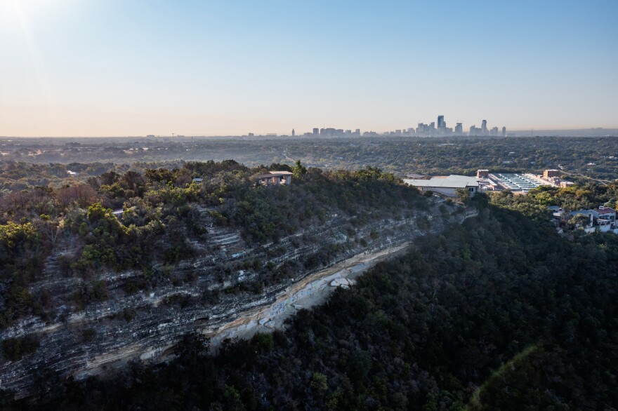 The Balcones Escarpment with the Austin skyline in the far distance