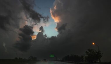 Storm clouds loom over traffic on President George Bush Turnpike in Sachse, Monday, April 27, 2026.