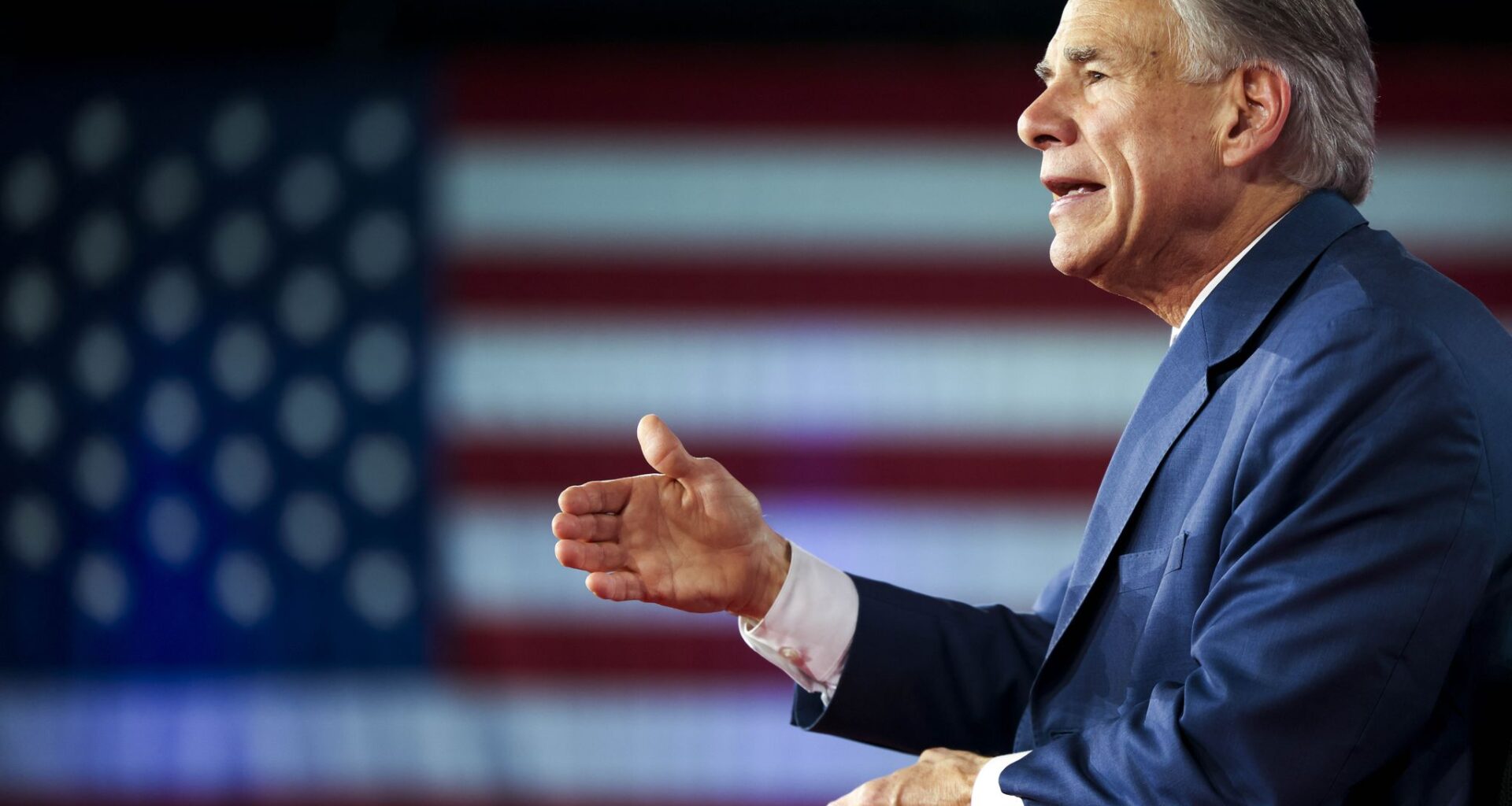 Texas Gov. Greg Abbott (right) speaks during the Conservative Political Action Conference, on Friday, March 27, 2026, at Gaylord Texan Resort and Conference Center in Grapevine.