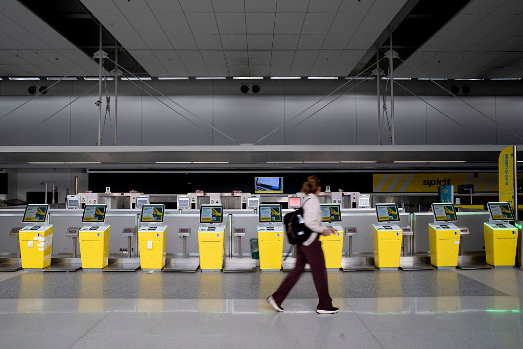 What happens to Spirit Airlines' old gates at Bush Airport?