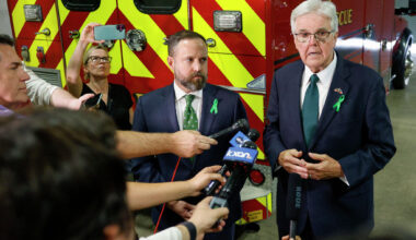 Lt. Gov. Dan Patrick (right) speaks to reporters alongside House Speaker Dustin Burrows, R-Lubbock, outside a joint hearing of the Texas Senate and House Select Committees on disaster preparedness and flooding, Thursday, July 31, 2025, in Kerrville, Texas.
