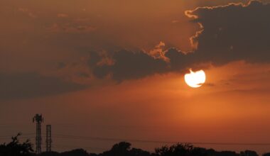 The sun sets behind clouds after a series of tornado-warned storms moved across North Texas on Tuesday, April 28, 2026, in Fort Worth.