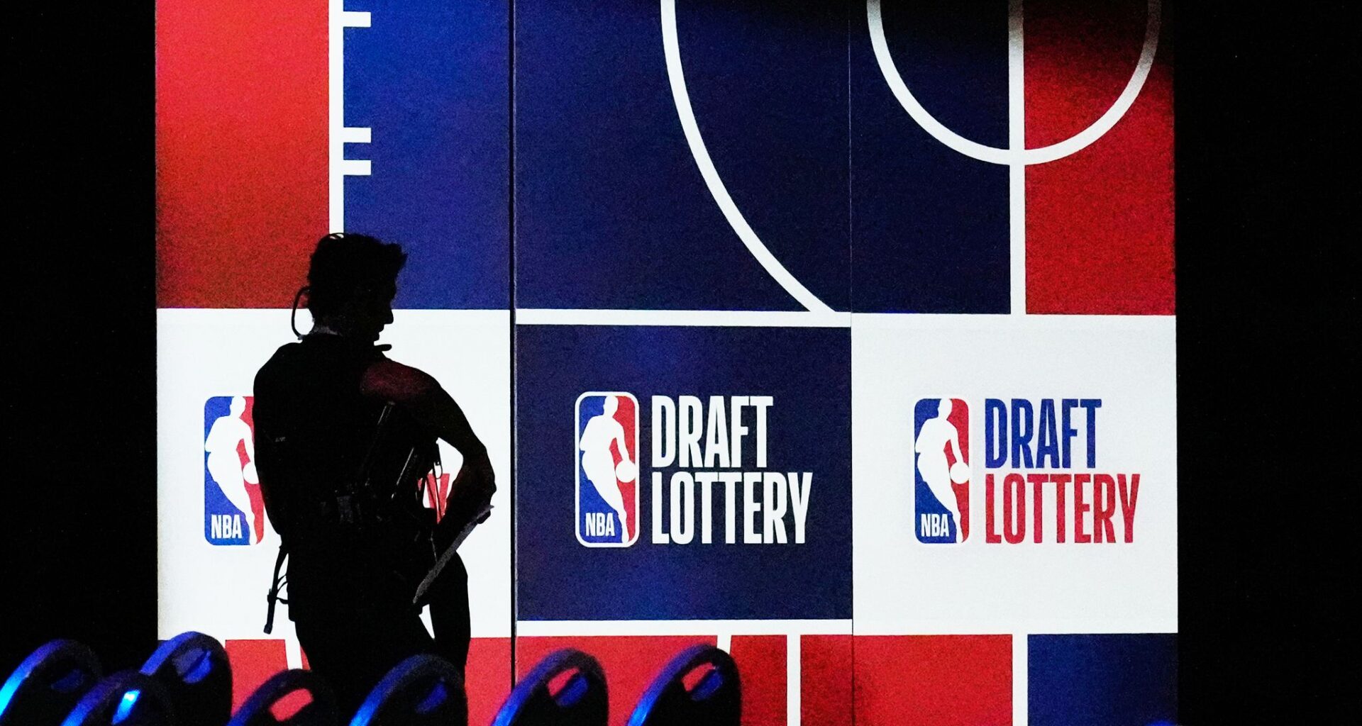 People attend the NBA basketball draft lottery in Chicago, Sunday, May 10, 2026. (AP Photo/Nam Y. Huh)
