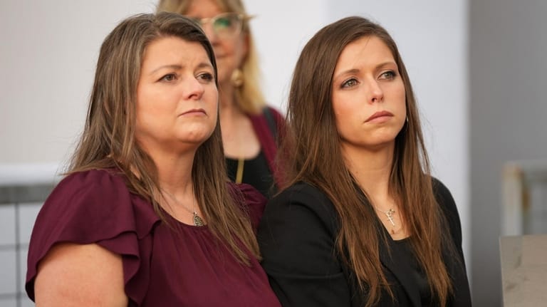 Kim Pierce, left, the widow of yogurt shop suspect, Maurice...
