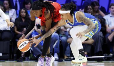 Dallas Wings rookie Azzi Fudd (second from right) watches from the bench in street clothes as her teammates faced the Atlanta Dream in the first half at College Park Center in Arlington, May 12, 2026.