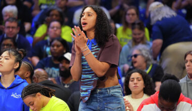 An injured Dallas Wings guard Azzi Fudd cheers from the bench during the first half of a WNBA basketball game against the Atlanta Dream in Arlington, Texas, Tuesday, May 12, 2026. (AP Photo/LM Otero)