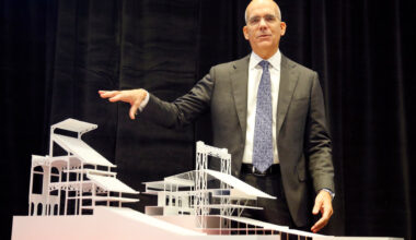 HKS executive vice president, director of sports & entertainment Bryan Trubey points to models of what the new Texas Rangers ballpark seating will look like when designed. The difference between the new (left) and existing (right) seating structure is that the seating configuration gives the fan a more intimate feel to the game by putting them closer to the field. The Texas Rangers baseball organization announced that HKS has been selected to design the new ballpark adjacent to Globe Life Park during a press conference in Arlington, Thursday, January 5, 2017.