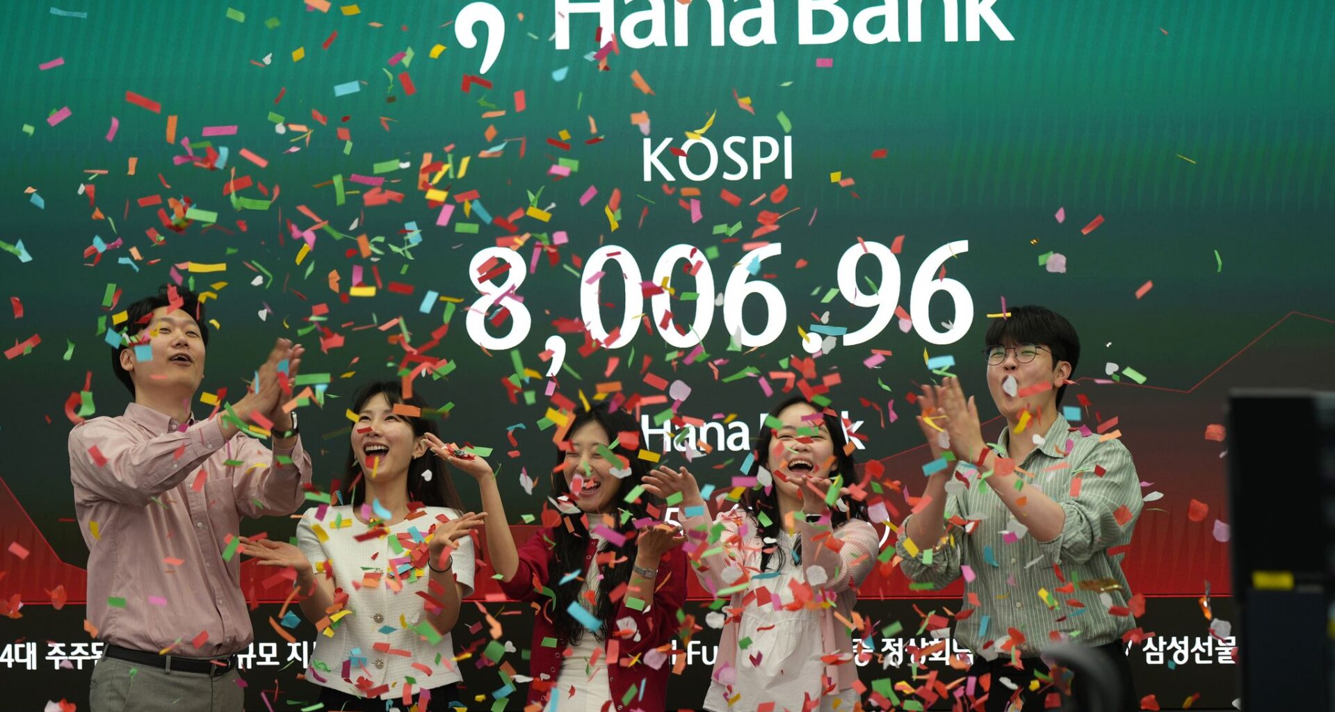 Asian stocks are lower after South Korea's Kospi hits records, as Trump wraps up Beijing trip